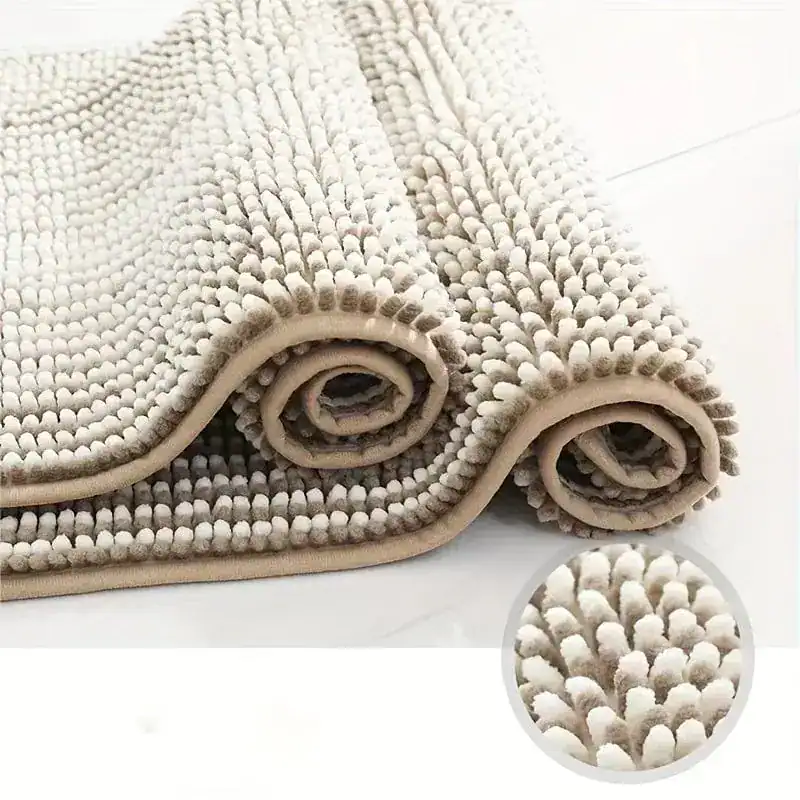 Badrumsmatta Chenille Randig, mjuk och vattentät med randig textur i beige och vit.