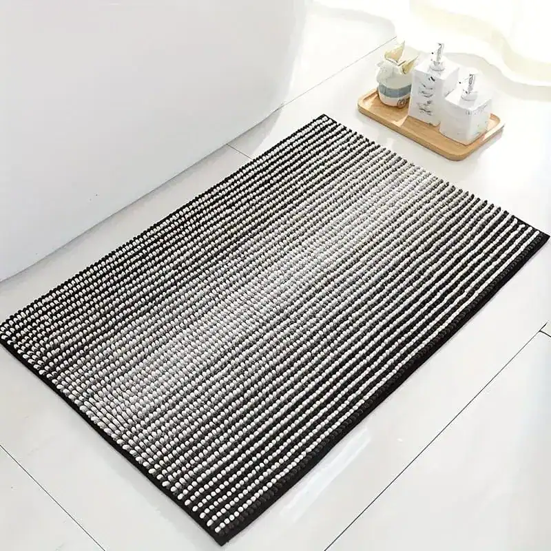 Badrumsmatta Chenille Randig svart-vit, texturerad matta för badrum med randig design.