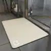 Badrumsmatta Diatomit 90 cm, beige, matta utanför duschen, vattentät och motståndskraftig.