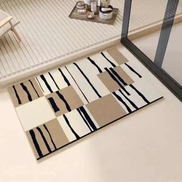Badrumsmatta Diatomit Färgblock med abstrakt mönster i beige, vit och svart.