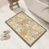 Badrumsmatta Diatomit Orientalisk med blommig mönster i beige och grön, placerad vid badkar.