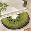 Badrumsmatta Kiwi i form av kiwifruktskiva, grön och svart, idealisk för badrummet.