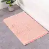 Ljusgrön badrumsmatta med mjuk chenille textur, idealisk för badrummet.