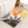 Badrumsmatta Löv Och Sol med färgglada blad och solmotiv i badrummet.