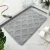 Badrumsmatta mikrofiber blå, mönstrad, idealisk för badrummet med stil och funktion.