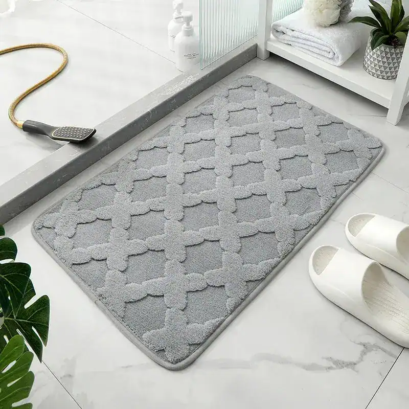 Badrumsmatta mikrofiber blå, mönstrad, idealisk för badrummet med stil och funktion.