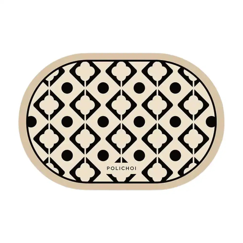 Oval badrumsmatta med svart-vit geometriskt mönster från Polichoi.