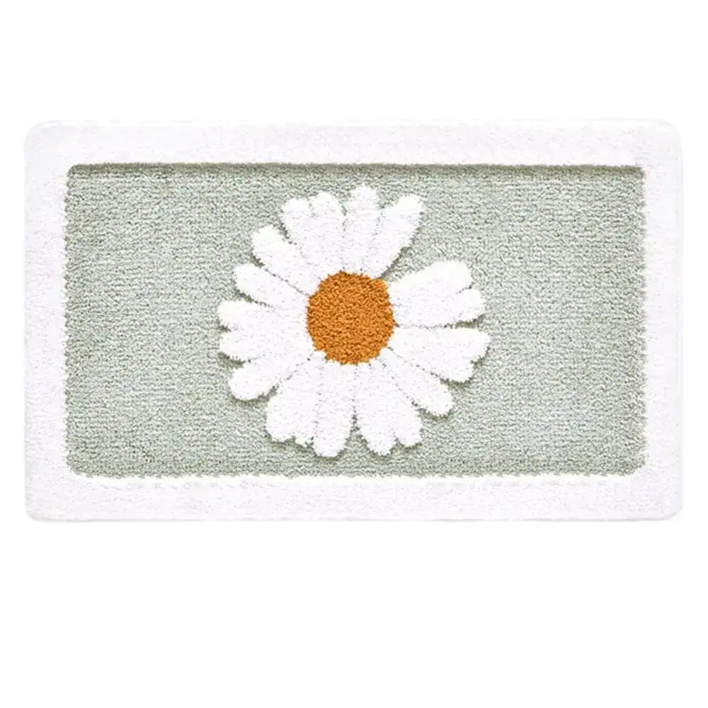 Badrumsmatta Prästkrage med vit kamomillblomma på ljusgrön bakgrund.