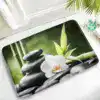 Badrumsmatta Zen Lotus med bambu, svarta stenar och vit orkidé – lugn och harmoni i badrummet.