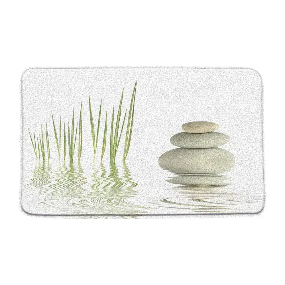 Badrumsmatta Zen Stenar med vatten och gräs, vit bakgrund, lugn och harmoni.