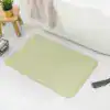 Brun badrumsmatta med rutig textur, idealisk för badrummet med vit badkar och marmorgolv.