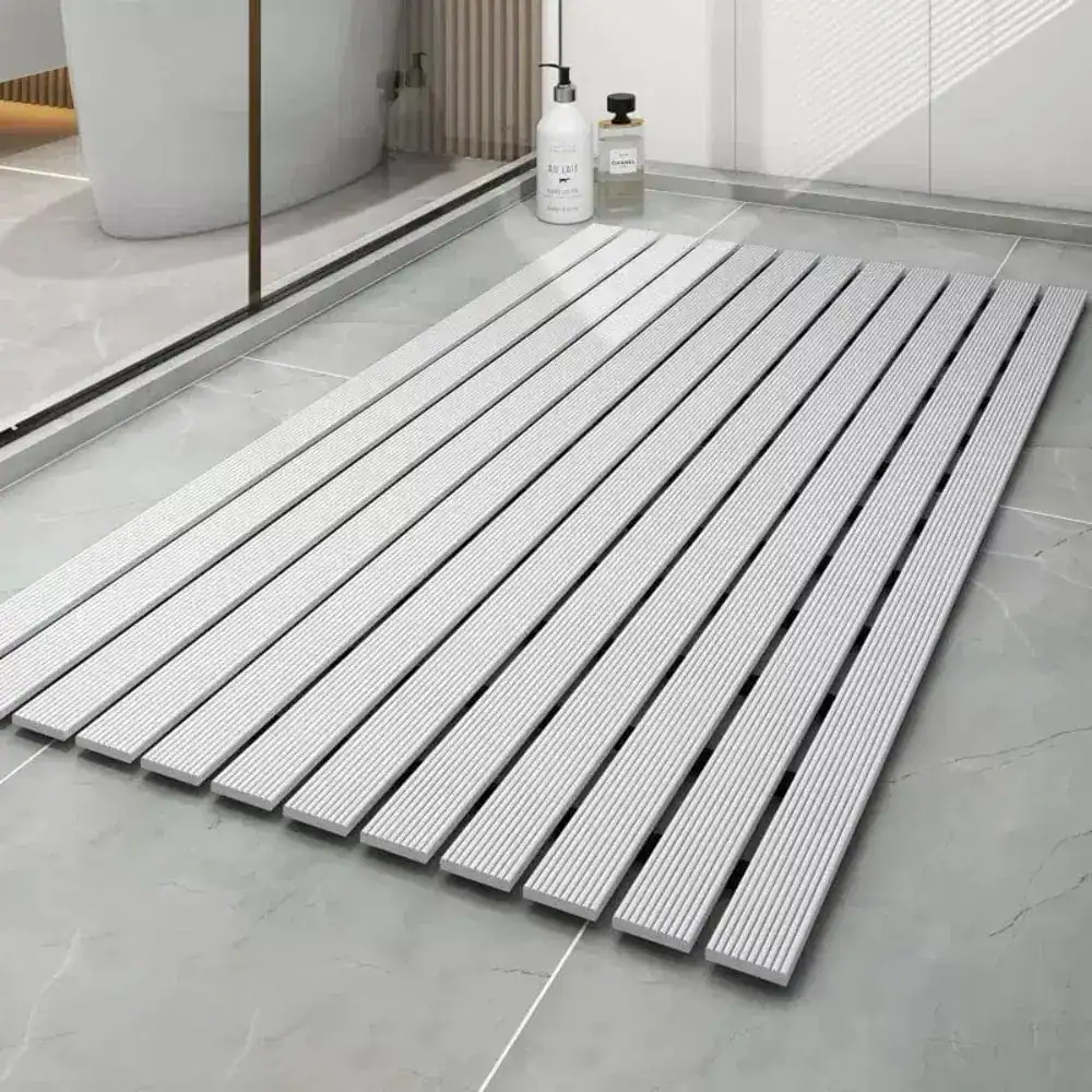 Duschmatta Golvrist i silverfärgad textil, modern design för badrum, vattentät och slipad yta.