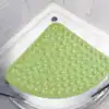 Duschmatta Kvartsrund Vit, grön, med texturerad yta för säkerhet i duschen.