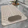 Duschmatta med fotskrubb i beige, med masseringspunkter och skrubbspår för badrummet.