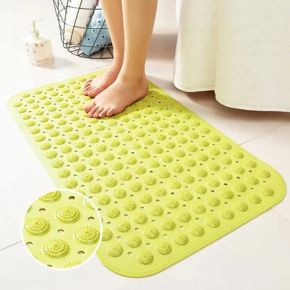 Grön halkmatta för badrum med massagering, rundad kant och texturerad yta för bättre grepp och avslappning.