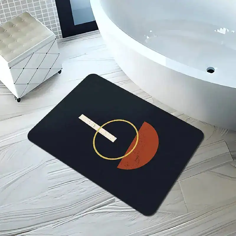 Stor badrumsmatta diatomit marinblå med geometriskt mönster i guld och orange.