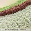 Badrumsmatta avokado i mikrofiber, hög densitet, flerfärgad design med grön, brun och vit textil.