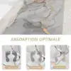 Oval badrumsmatta med marmormönster och optimal absorption – 1, 3 och 5 sekunder.