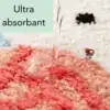 Ultraabsorbent badmatta för barn, färgglad och mjuk, visar vattentäckning i röd och vit ton.